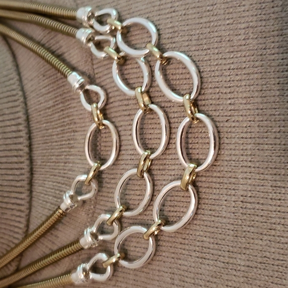 Very pretty silver and gold set.  Necklace, earrings and bracelets. - Picture 2 of 4